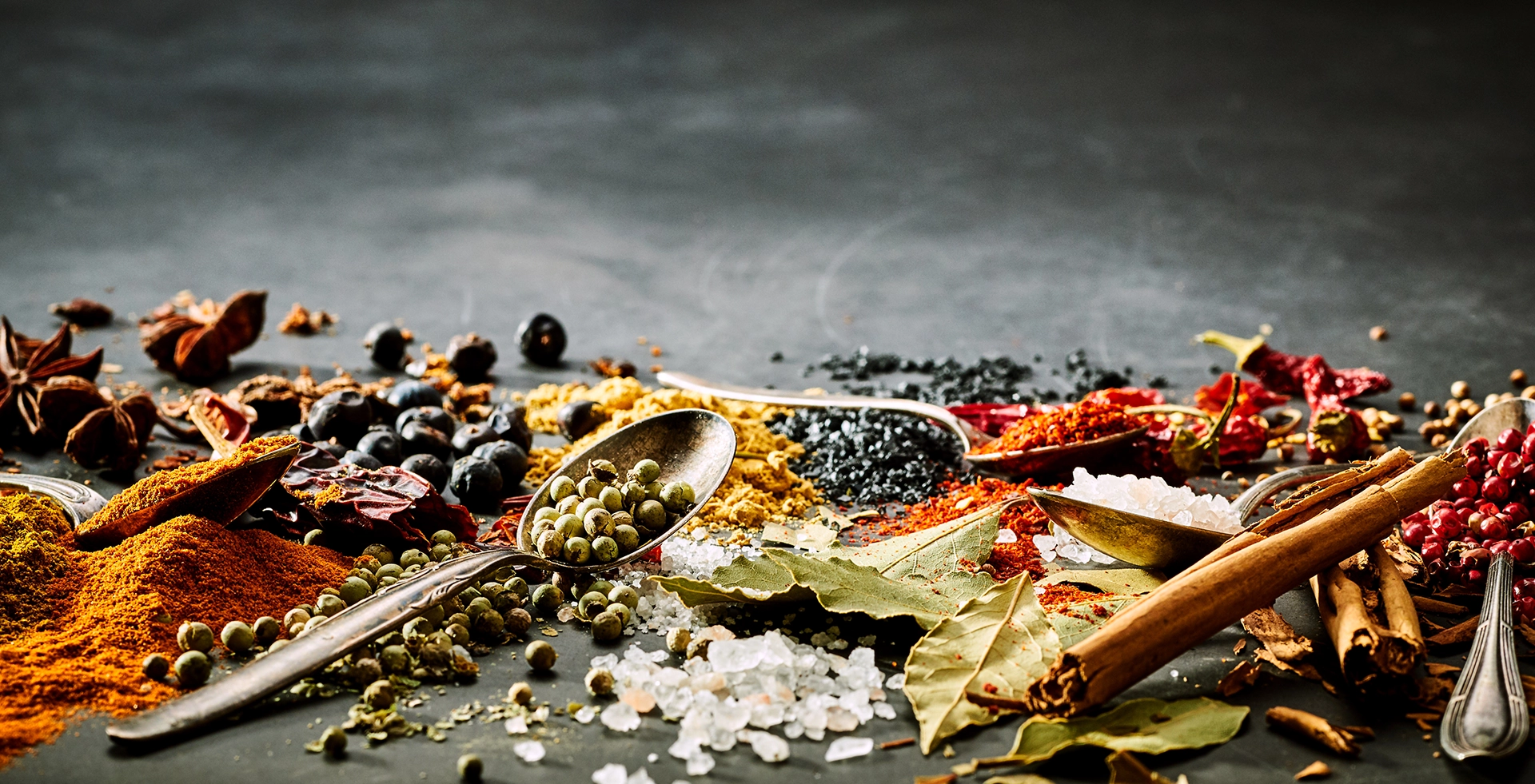 Piles of premier spices provided by The Spice Standard